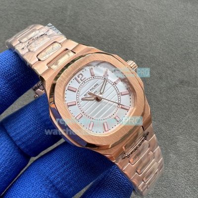 Replica Patek Philippe Nautilus Rose Gold Strap Silver Face Rose Gold Bezel Watch 35mm